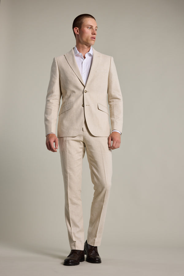 Man wearing Barkers William Texture Linen Pant, white shirt, and dark brown shoes.