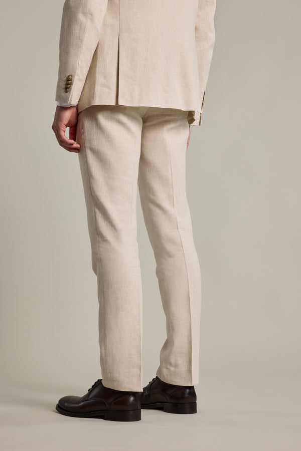 Model wears Barkers William Texture Linen Pant, beige, shown from the back on a neutral background.