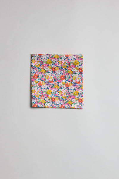 The Liberty Libby Pocket Square features a colorful floral print on soft Tana Lawn cotton.