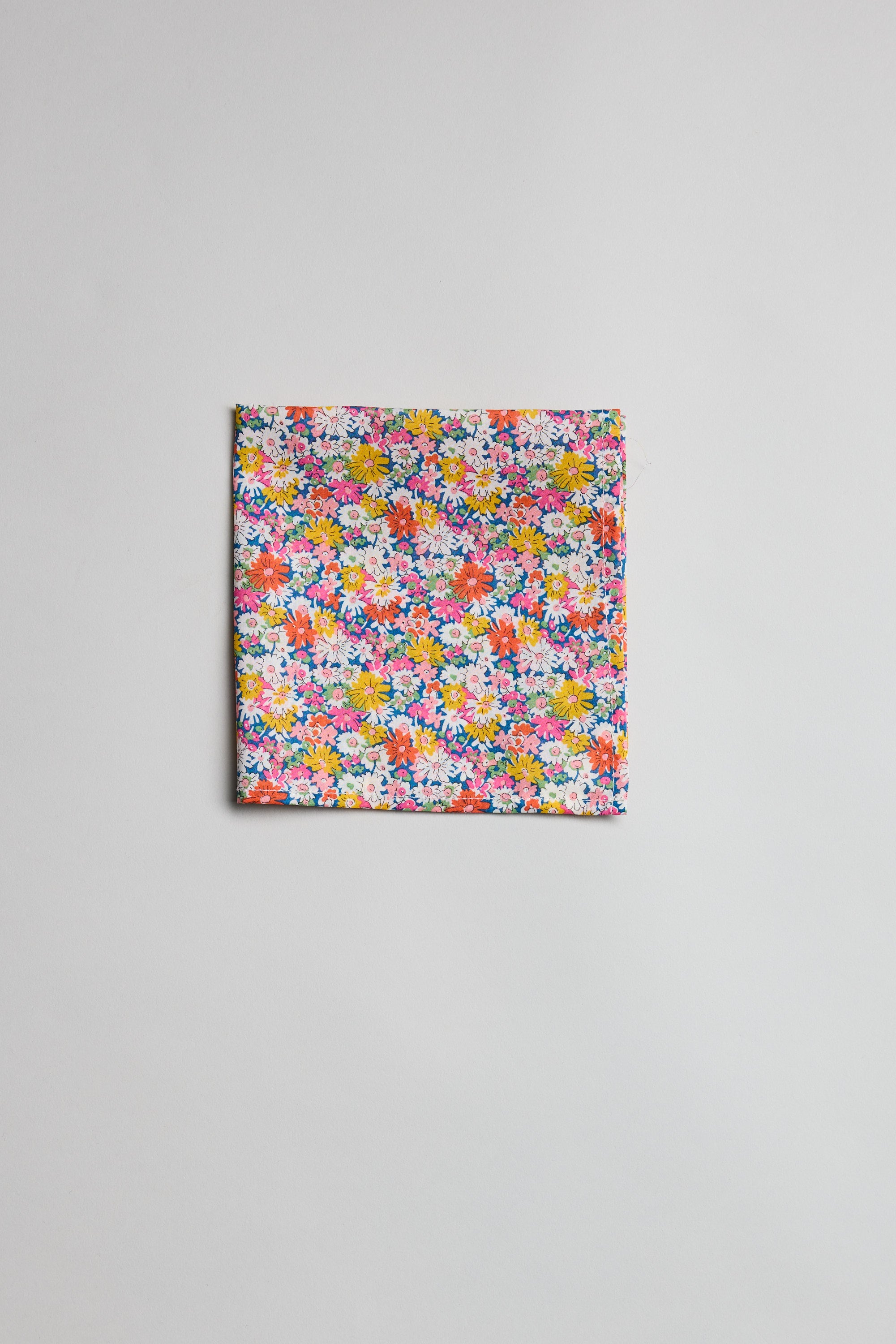 The Liberty Libby Pocket Square features a colorful floral print on soft Tana Lawn cotton.
