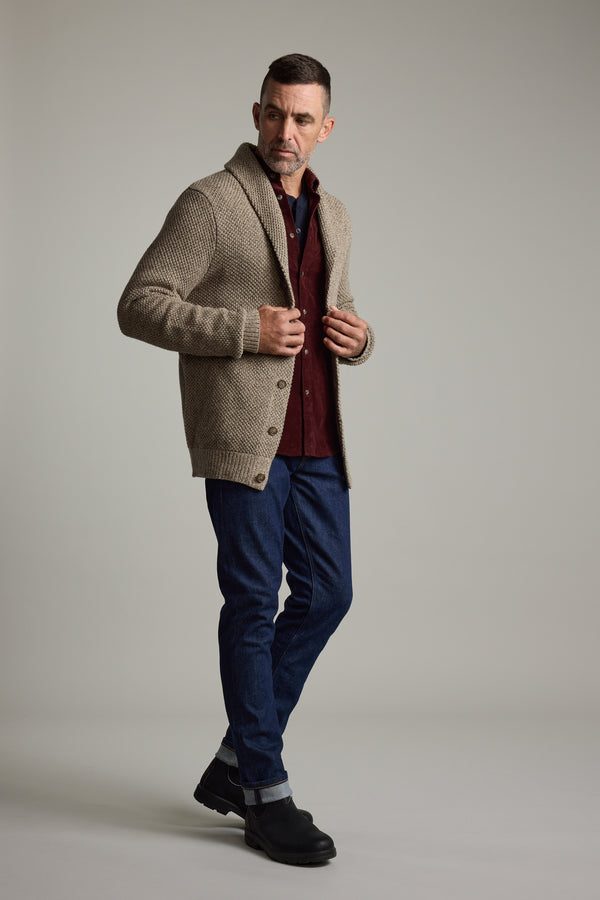 Man in Barkers Rudder Cotton Shawl Cardi and boots, perfect for winter layering.