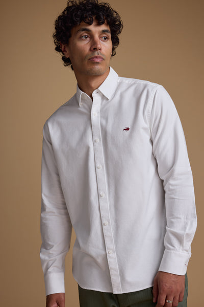 Man in Barkers Maynard Oxford Shirt, classic fit white 100% cotton with logo on chest.