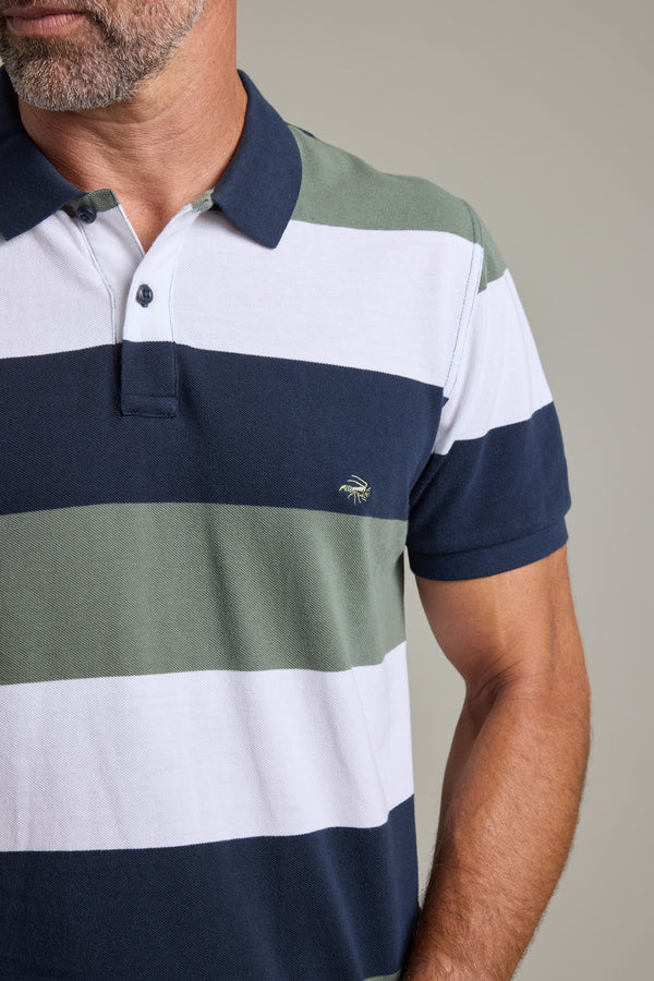 Man in Barkers Regent Pique Stripe Polo—limited edition, navy, green & white stripes.