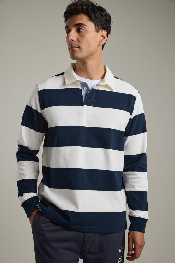 Man wearing Barkers Provincial Long Sleeve Rugby Jersey in navy/white, responsibly sourced cotton.