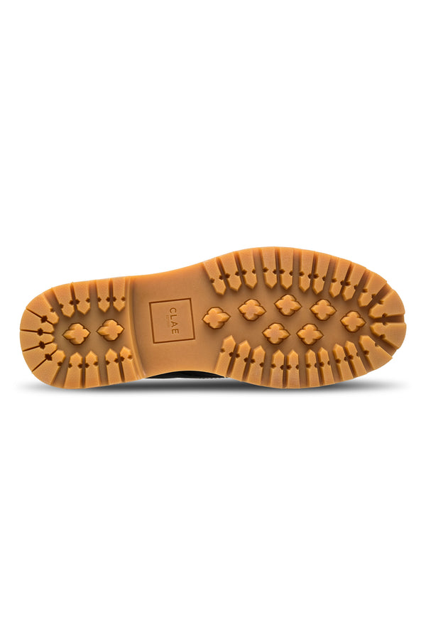 Tan rubber sole with textured grip, Clae logo, crafted for the CLAE Logan Heritage Collection.