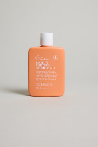 Feel Good Sensitive SPF 50+ by Other, orange bottle, fragrance free, on a light background.