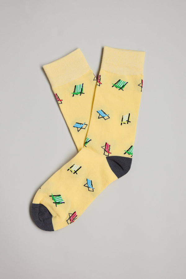 The Barkers Deck Chair Sock features colorful deck chair patterns with dark gray toes and heels, laid flat on a light gray background—an ideal quirky Secret Santa or Christmas gift.