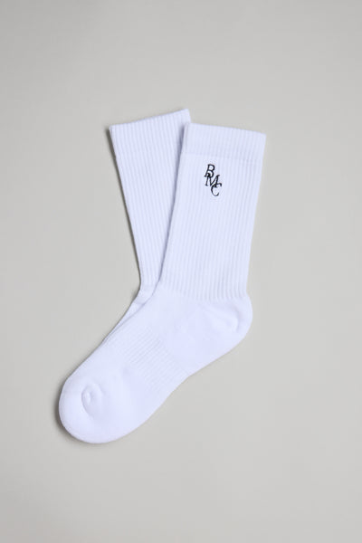The Barkers BMC Ribbed Sock is a white crew sock featuring a small black BMC logo embroidered near the top, shown against a light gray background.