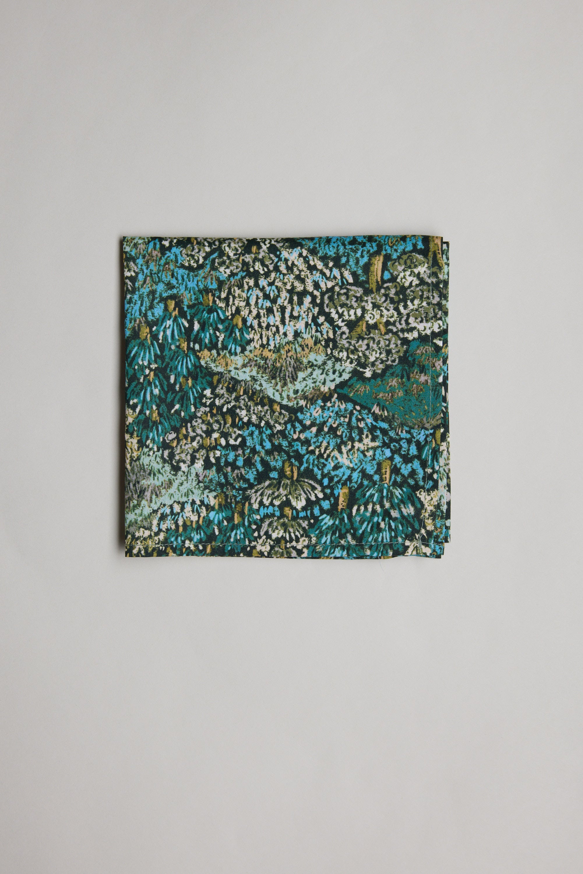 Liberty Darley Hillside Pocket Square in blue, green, and white abstract floral cotton.