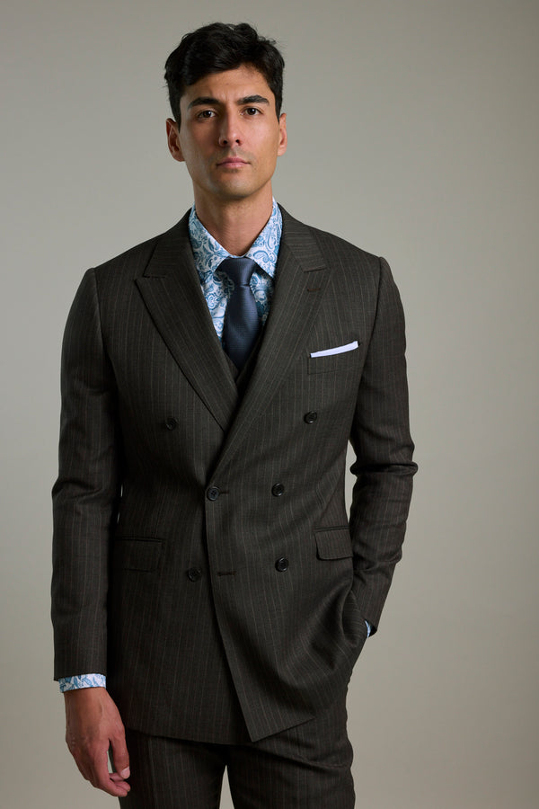 Man in Barkers Radcliffe Stripe Double Breasted Suit Jacket with blue tie and patterned shirt.