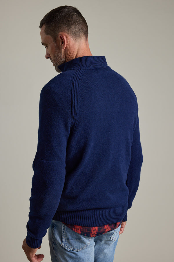 Man in a Barkers Rowley Woollen 1/4 Zip and jeans, facing away against a plain background.