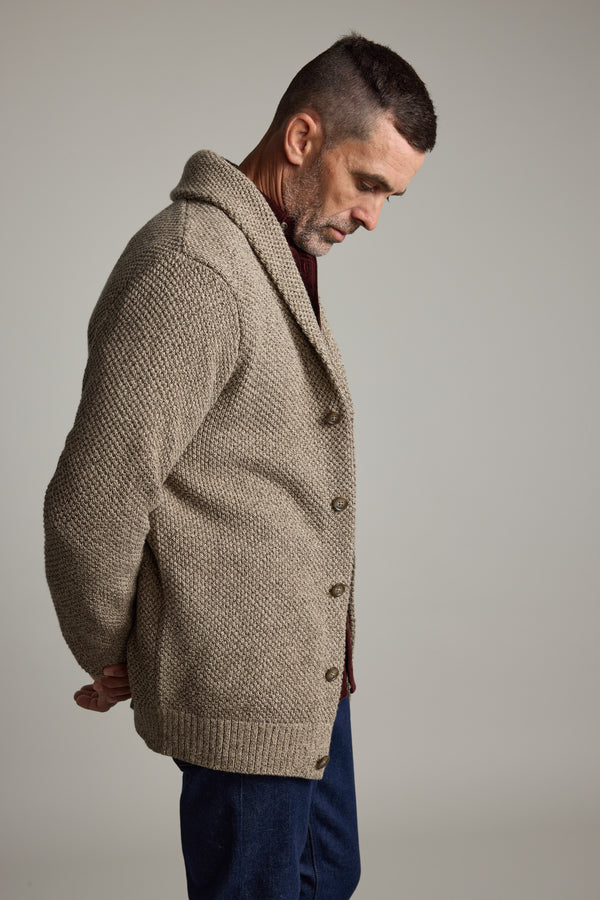 Man wears Barkers Rudder Cotton Shawl Cardi—a must-have layering piece for winter.