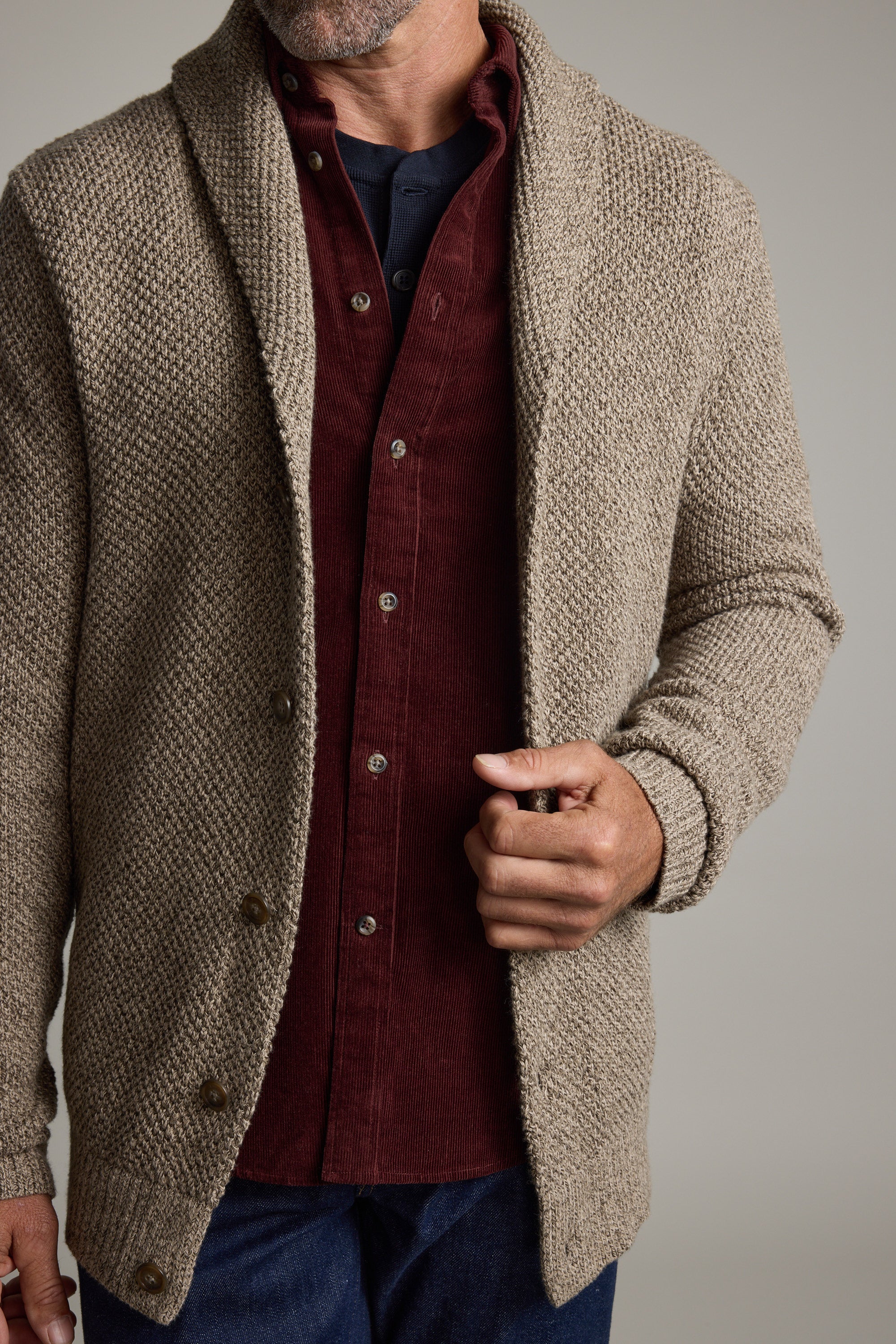 Man wearing the Barkers Rudder Cotton Shawl Cardi, ideal for winter layering in soft cotton.