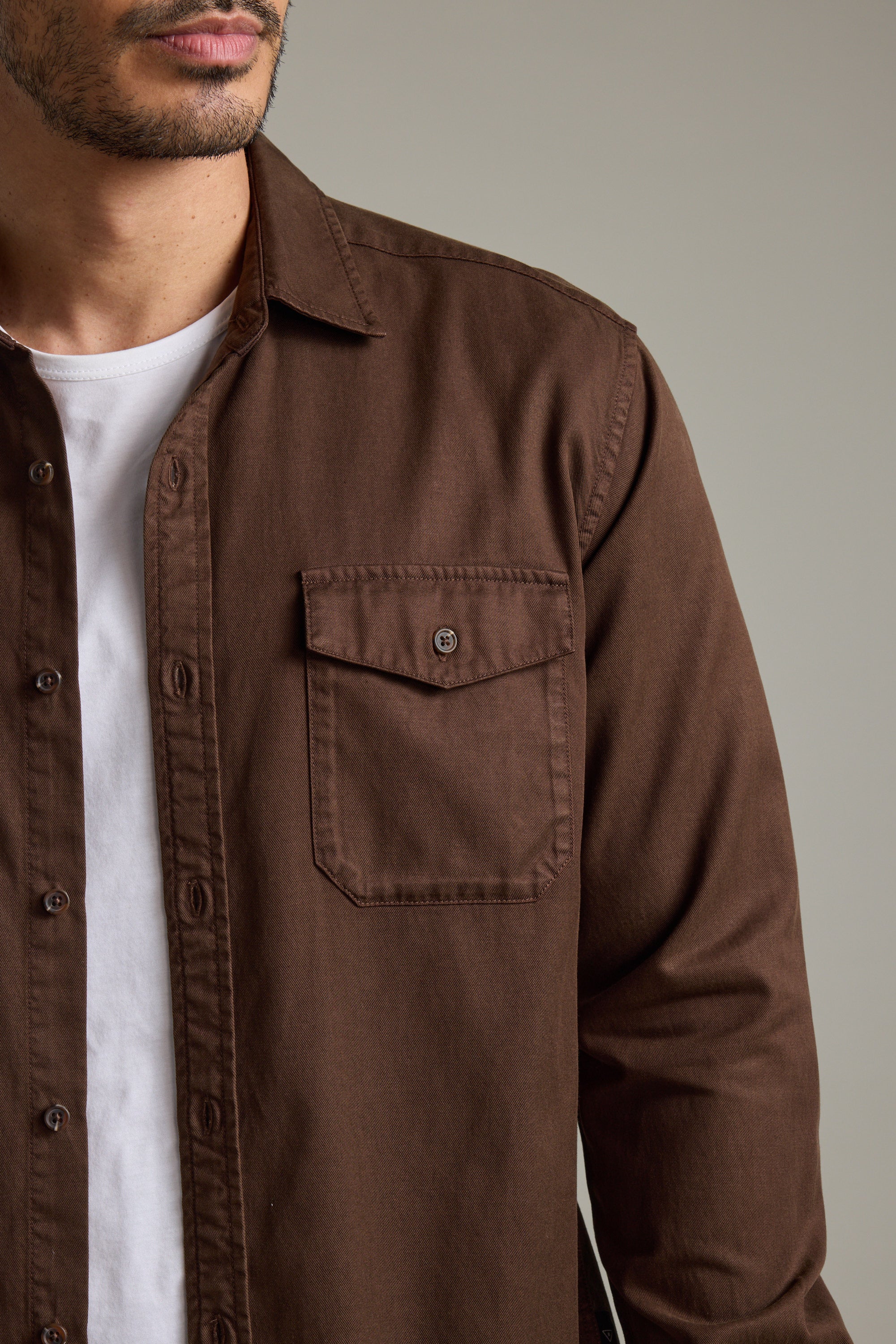 Man in a Barkers Darden Shirt over a white tee, shown from shoulders to mid-torso.