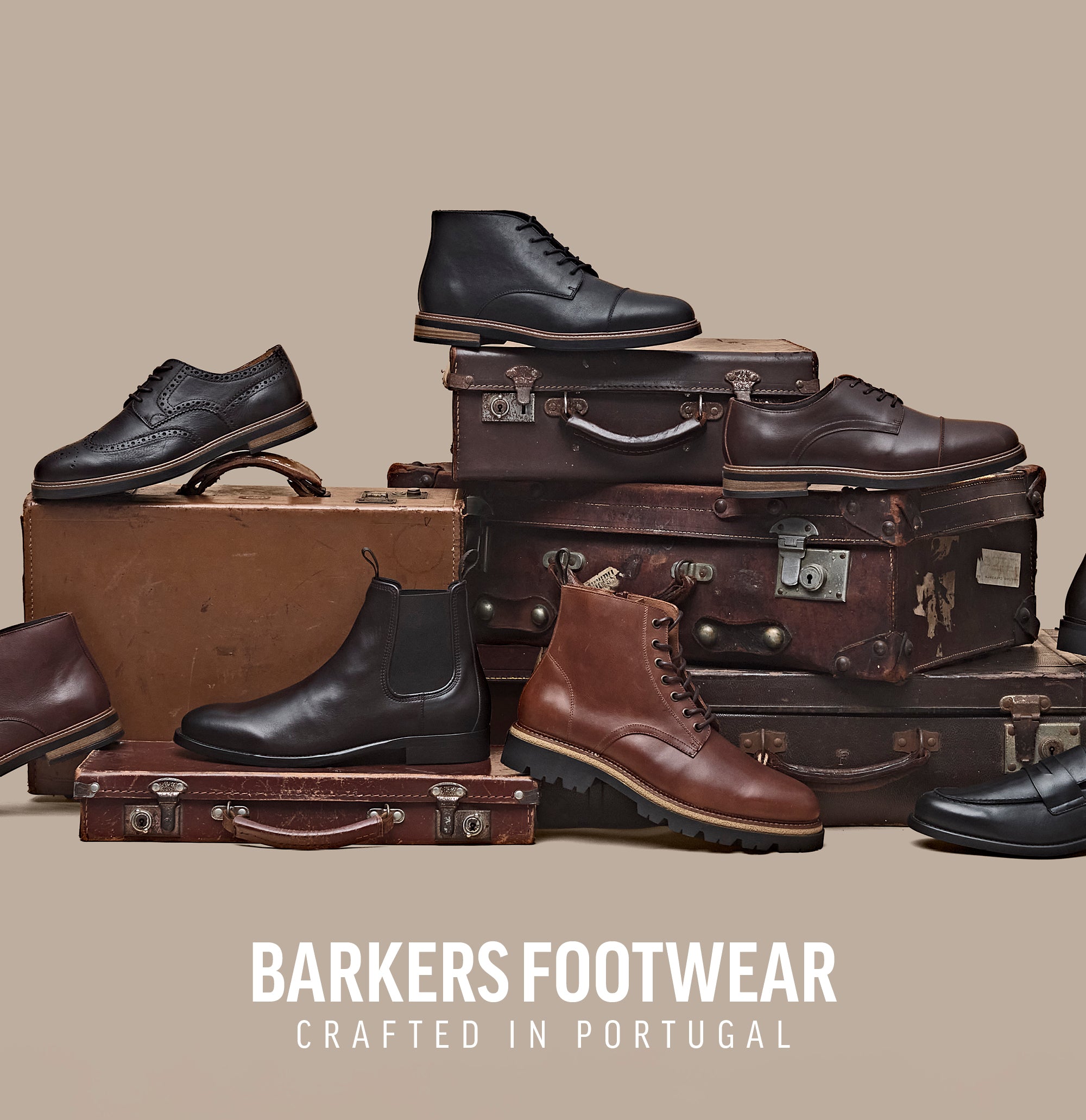 Six pairs of men's shoes on vintage suitcases, with text Barkers Footwear NZ Crafted in Portugal.
