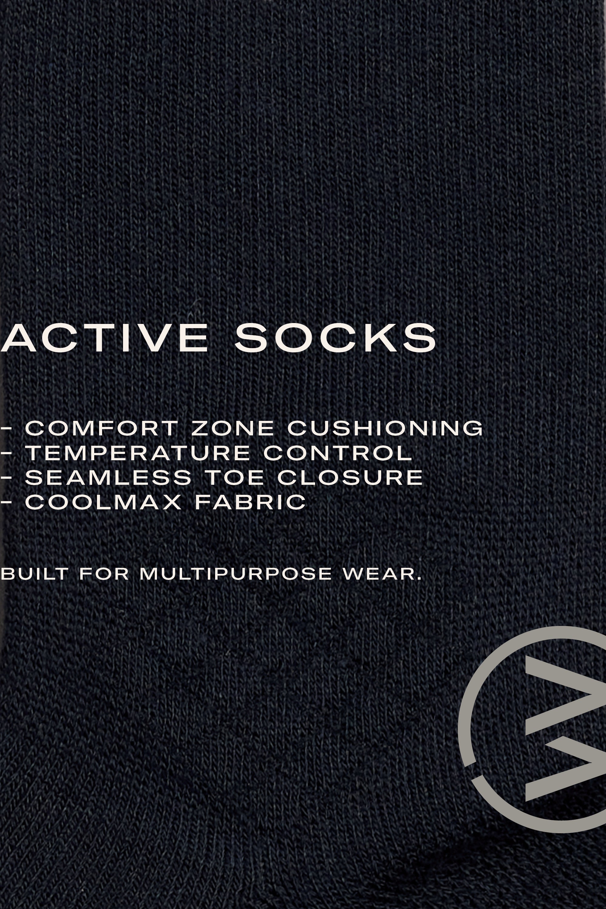 Close-up of WearEver Active Socks by WearEver: black fabric with white ACTIVE SOCKS text, comfort zone cushioning, temperature control, seamless toe, moisture-wicking Coolmax fabric, circular logo bottom right. Made in New Zealand.