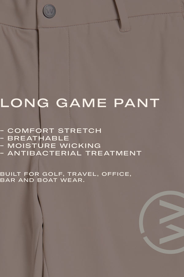 Close-up of WearEver Long Game Pant in beige, featuring a chino-inspired design. Lightweight, breathable, moisture-wicking, stretch fabric with antibacterial treatment. Ideal for golf, travel, office, bar, or boat. WearEver logo visible.