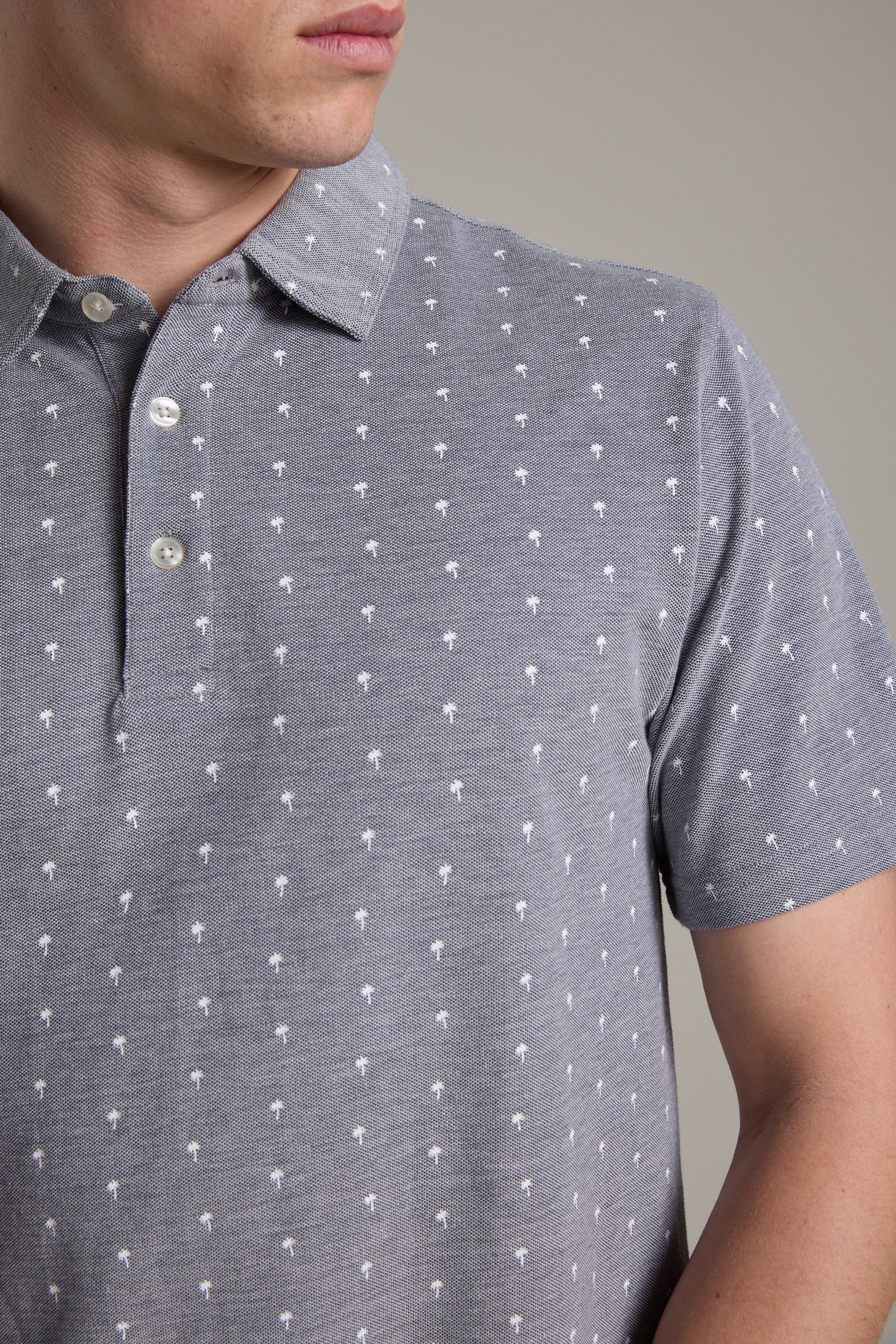 A close-up of the Barkers Melrose Pique Polo, crafted from organic cotton and ideal for summer style.
