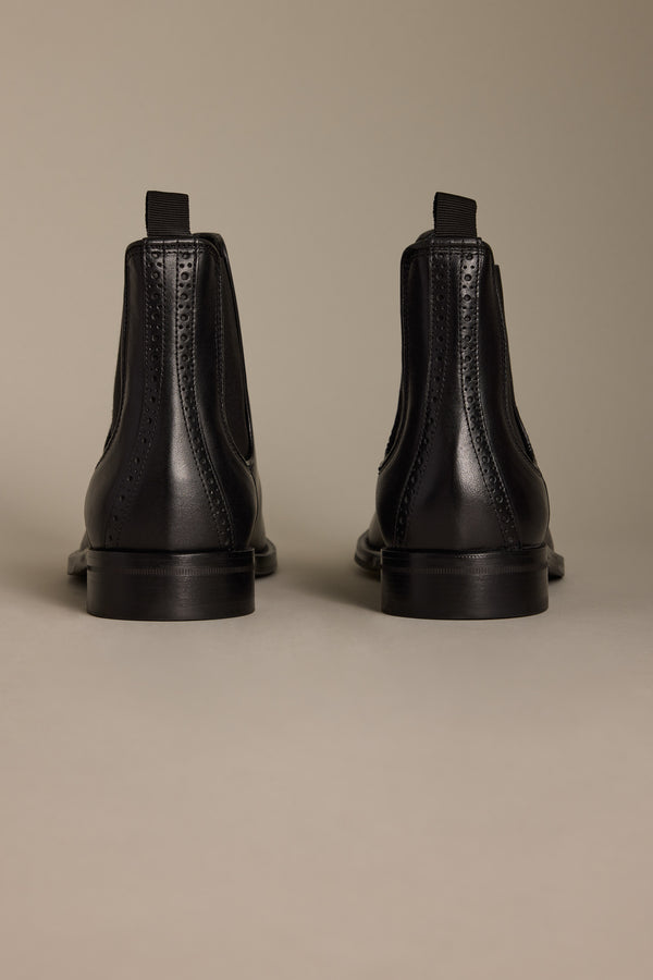 Two Barkers Peter Chelsea Boots viewed from the back against a neutral background.