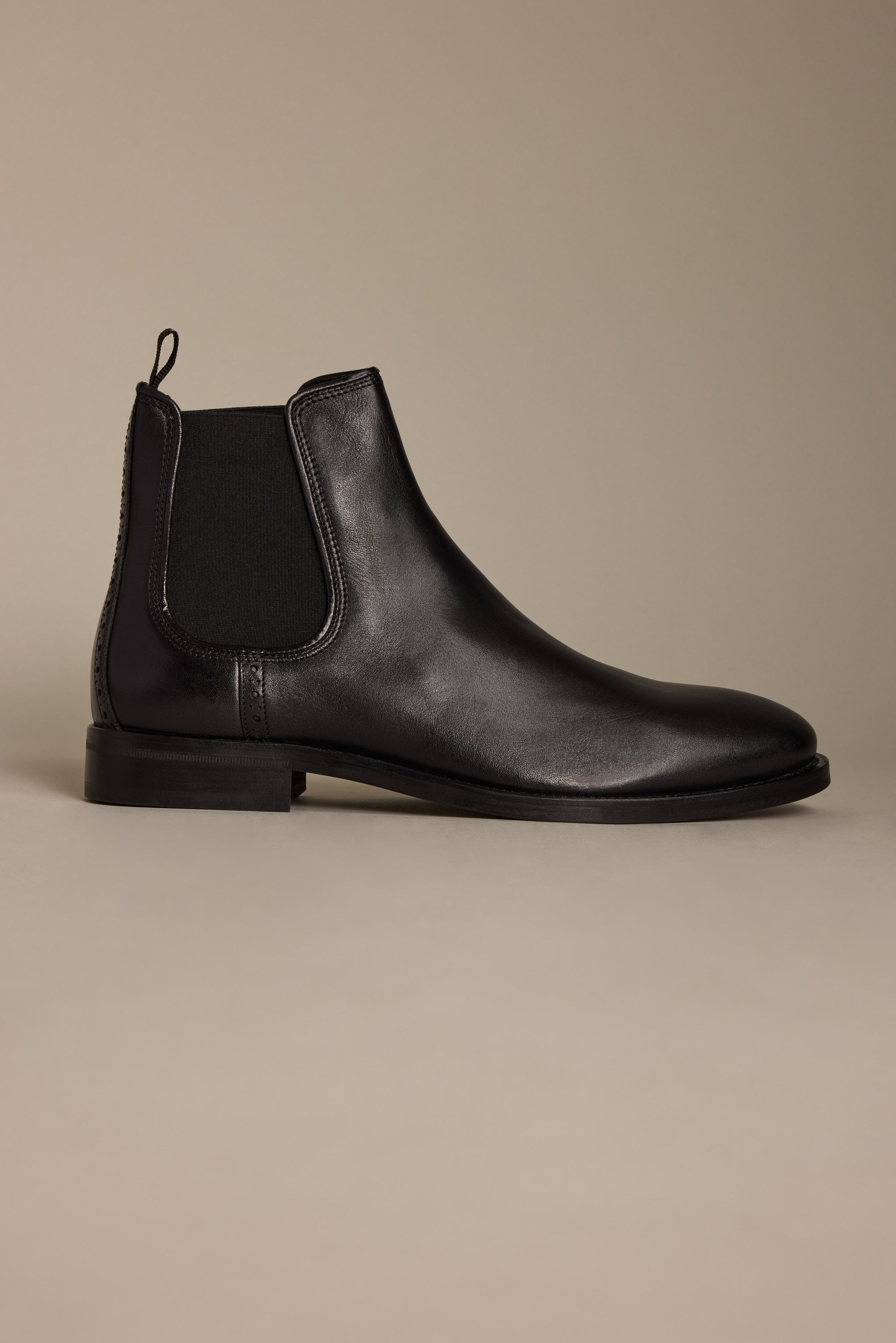 Barkers Peter Chelsea Boot—black leather with elastic side panel, classic style on display.