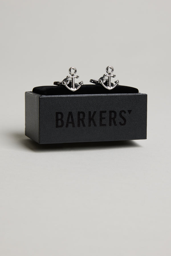 A pair of Barkers Anchor Cufflinks is displayed on a black box with "BARKERS" printed on it, set against a plain light grey background.
