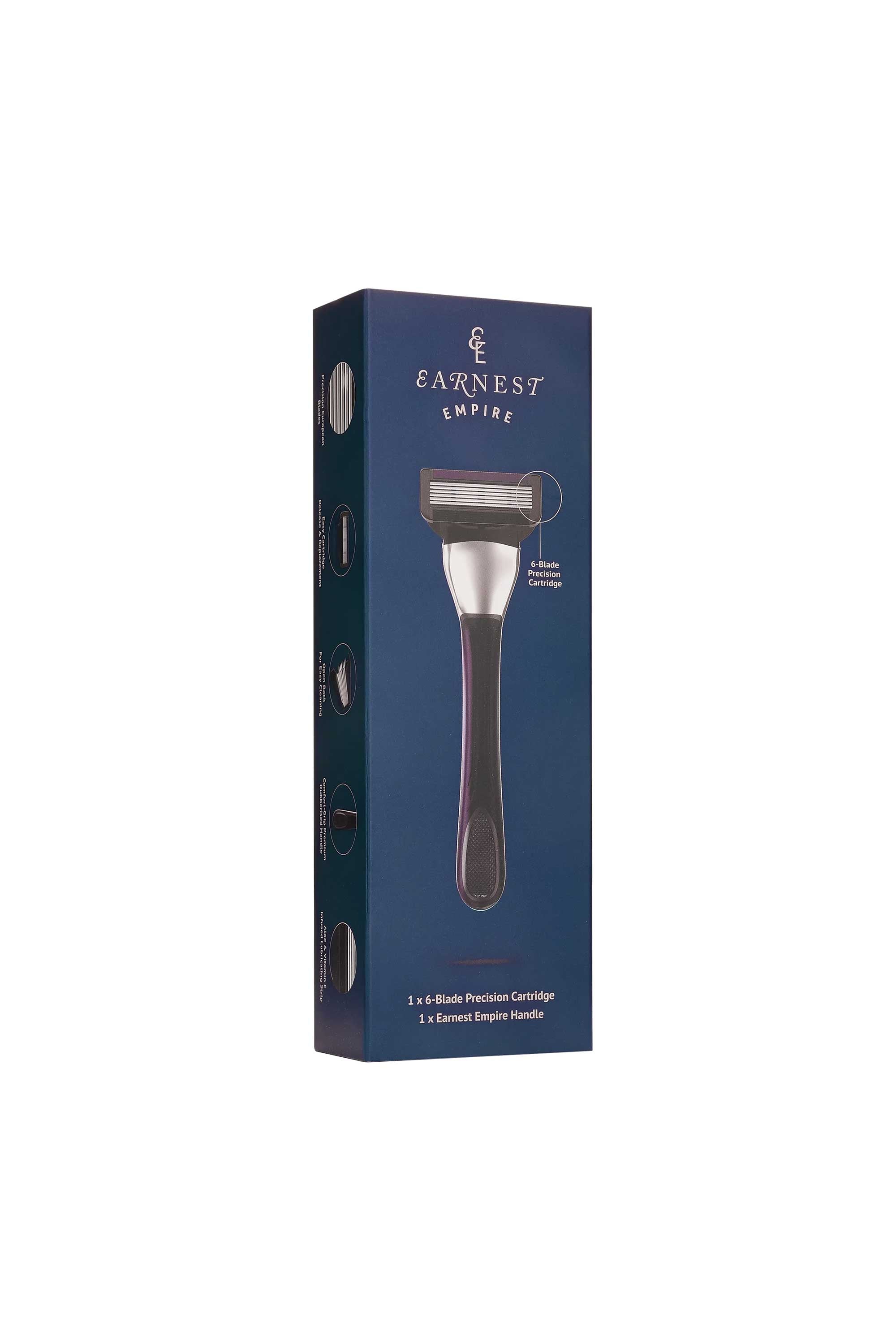 The Earnest Empire Starter Kit - Handle & Cartridge by Other features a metal and black razor handle with a single blade European-made precision cartridge, displayed upright in blue branded packaging.